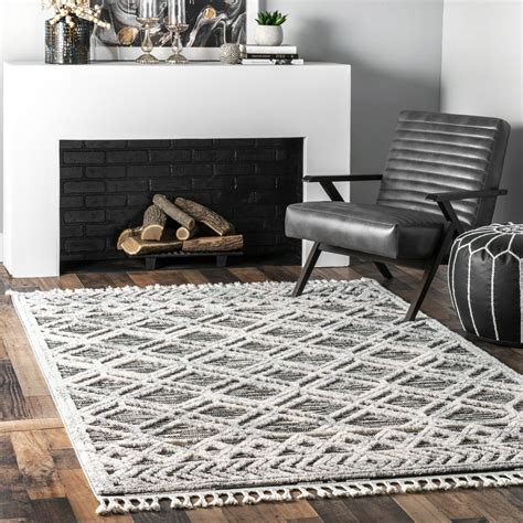 white tassel rug